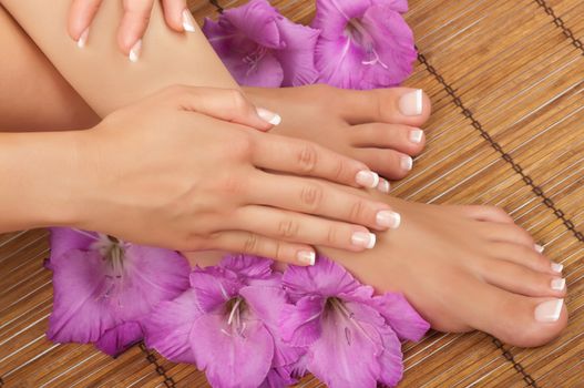 Pedicure and manicure spa with beautiful flowers