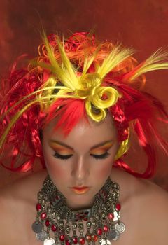 Girl with red, orange, yellow hair and beautiful make up