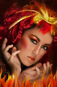 Girl with red, orange, yellow hair and beautiful make up 