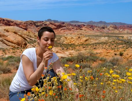 Breast cancer patient enjoying life again after chemo treatment ( wild flowers in the desert)