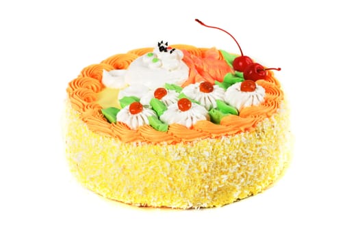 cream cake closeup with cherry on a grey