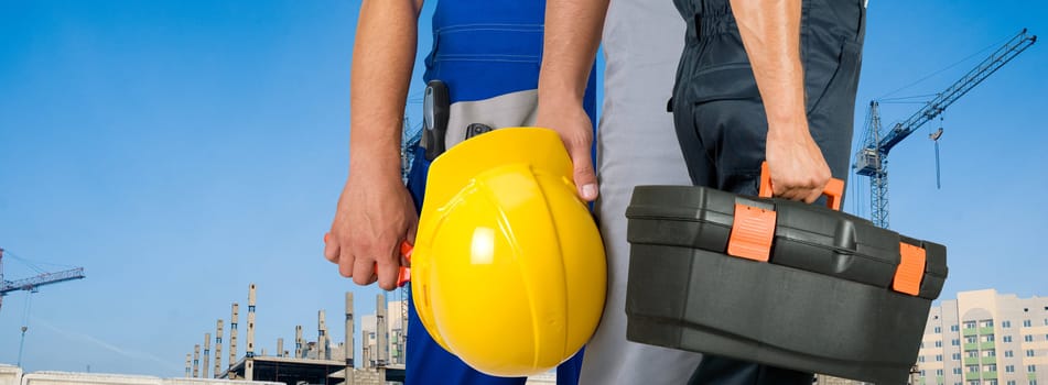 Different workers man closeup on building background