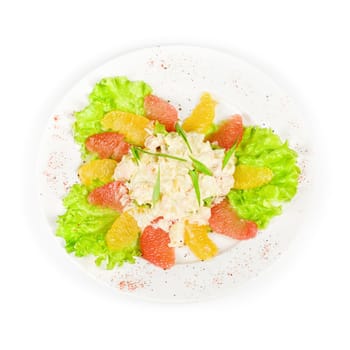 seafood salad of shrimp baked at cream with orange and grapefruit isolated on a white background