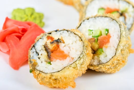 Sushi rolls at plate isolated on a white