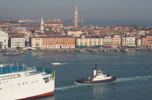 View of Venice with a towing vessel in the foreground