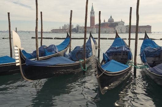 Gondolas in Venice, opposite the island of San Giorgio in winter