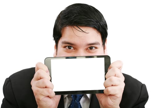 Young businessman holding a touch pad tablet pc on isolated white background