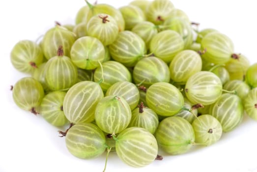 green ripe gooseberries isolated on a white background