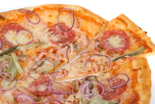 pizza closeup with smoked meat, salami, gherkin, onion and mozzarella cheese