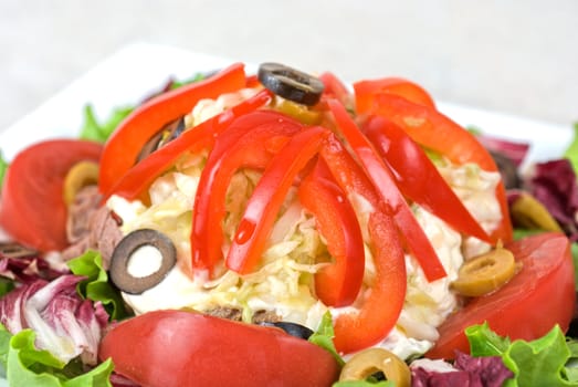 spicy salad of roast beef with potato, tomato, cabbage, pepper and lettuce