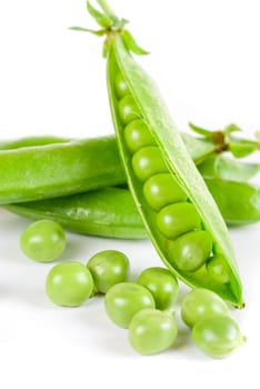 Ripe pea vegetable with green leaf isolated on white background