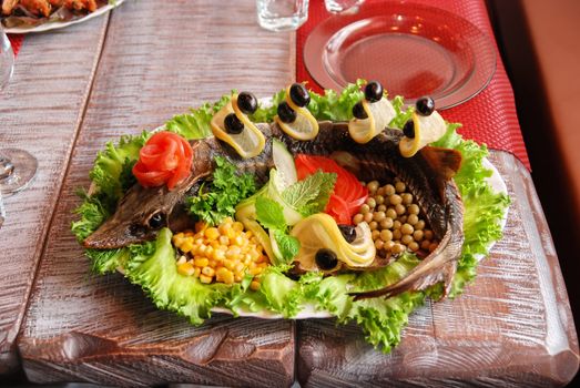 Prepared Sterlet with vegetables tasty dish