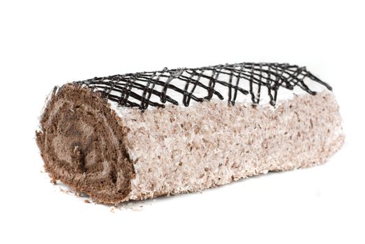 Chocolate Swiss roll closeup isolated on a white background