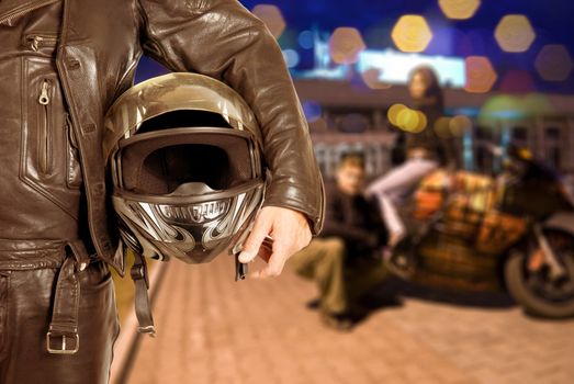 Biker closeup at night city background