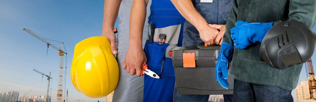 Different workers man closeup on building background