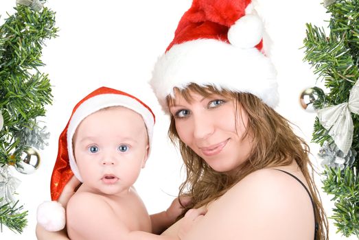 Beautiful mommy santa and her baby Santa boy on a white