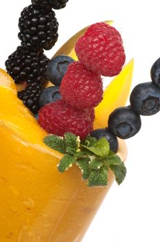 Healthy fruit drink made with mango, papaya, pineapple and kiwi