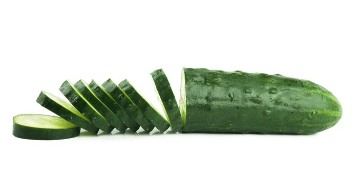 Macro view of cutted cucumber isolated over white background