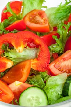 Fresh salad with tomatos cucumbers and peppers