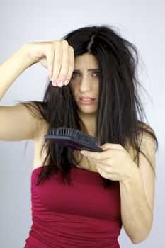 Hair loss problem sad and terryfied woman