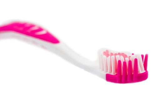 White-pink pure tooth-brush isolated on a white background