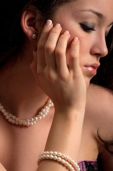 Girl with pearl jewelry