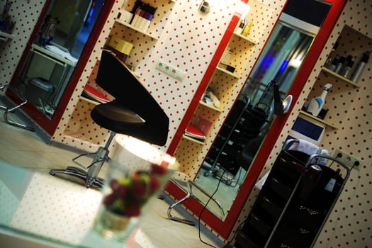 Interior of luxury modern hairdressing salon in pin-up style