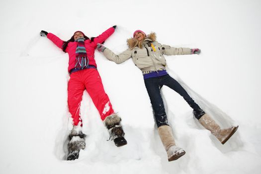 winter woman lay on snow