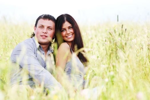 two lovers on grass field