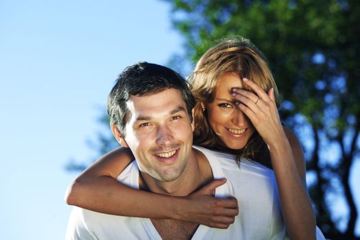 man and woman hug in the sky