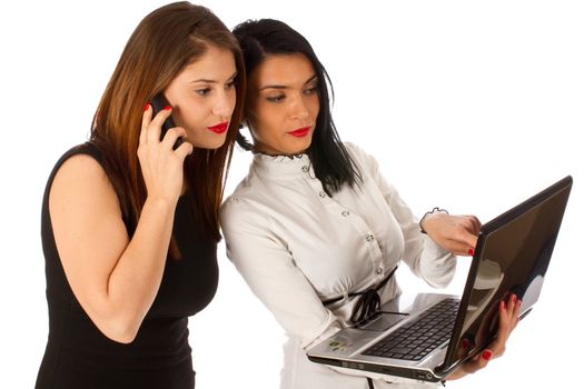 Office woman, business woman working on a laptop while standing 