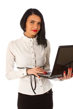 Office woman, business woman working on a laptop while standing 