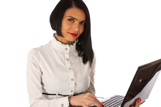 Office woman, business woman working on a laptop while standing 