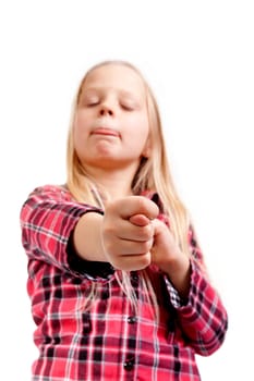little girl shows his tongue and three fingers crossed