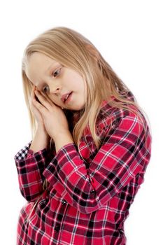 tired little girl wants to sleep on white background