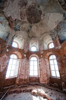 Old and abandoned church interior, made from red bricks