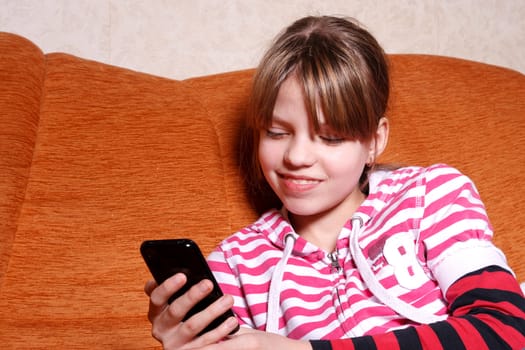 girl play games on her Touchscreen Phone
