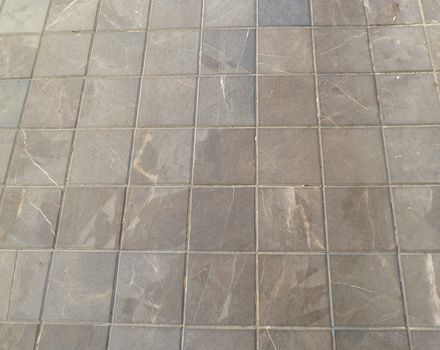 closeup of a section of square block paving