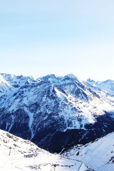 Winter alpine mountains covered with snow