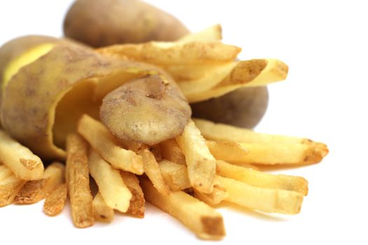 french fries and raw potatoes concept isolated on white
