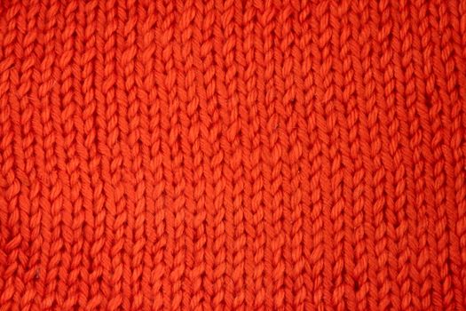 Wool knitted textured background close up