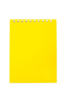 An image of yellow notebook on white background