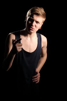 portrait of a teenager on darken background