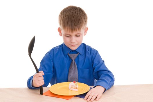 child with a large spoon isolated on white background