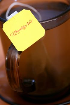 An image of yellow label of tea closeup