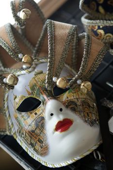 An image of beautiful venetian mask with bells