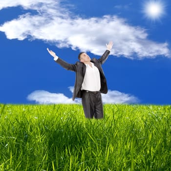 Happy man over green field.The ecology concept