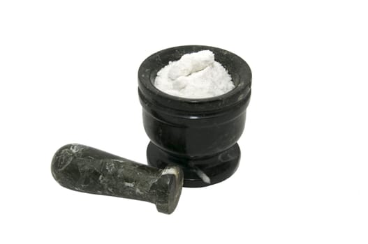 mortar with salt for grinding food on white background