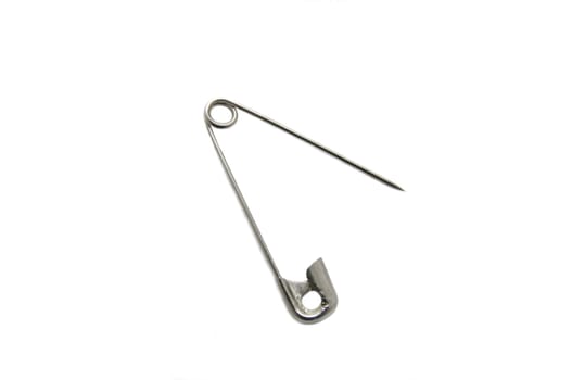 a safety pin on a white background