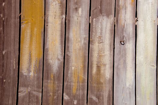 Background of old rural farm building wall made of wooden planks.